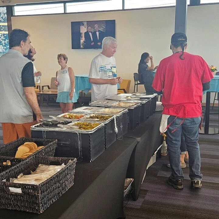 A Meat and Greet buffet line set up and ready for guests at an event