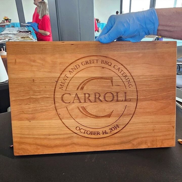 Jim's wooden cutting board, engraved with the Carroll name