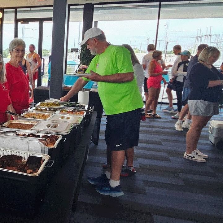 Guests serving themselves at the buffet