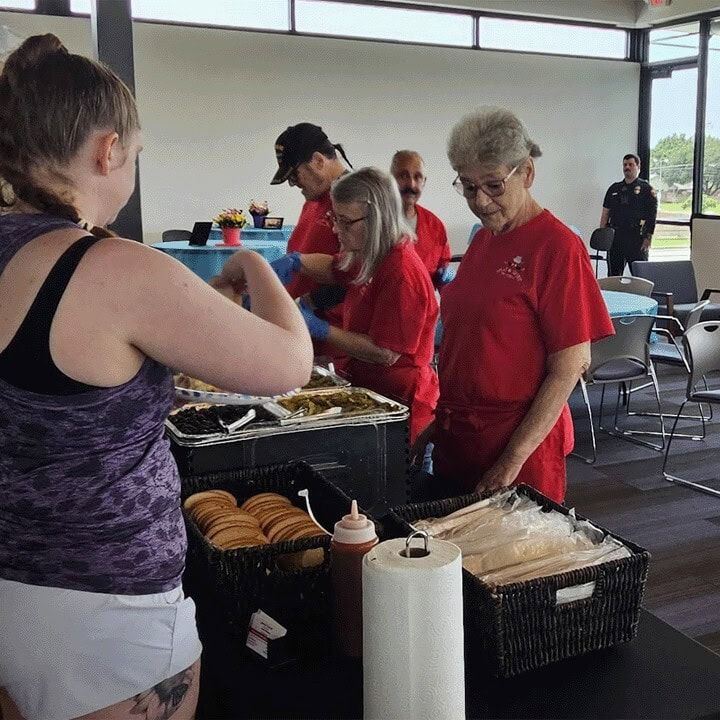 The Meat and Greet team serving guests at an event